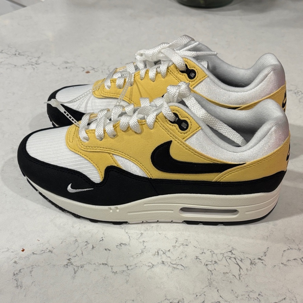 Nike Air Max..Black, Yellow/Gold, and white